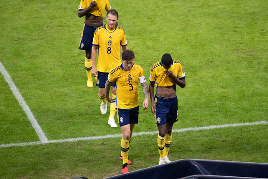 Albin Ekdal and Alexander Isak of Sweden look dejected