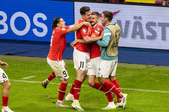 Michael Gregoritsch of Austria celebrates