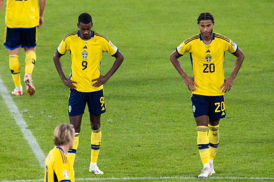 Alexander Isak and Jens-Lys Michel Cajuste of Sweden look