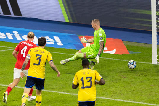 Marko Arnautovic of Austria (not in picture) scores 2-0