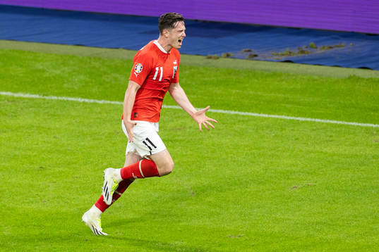 Michael Gregoritsch of Austria celebrates