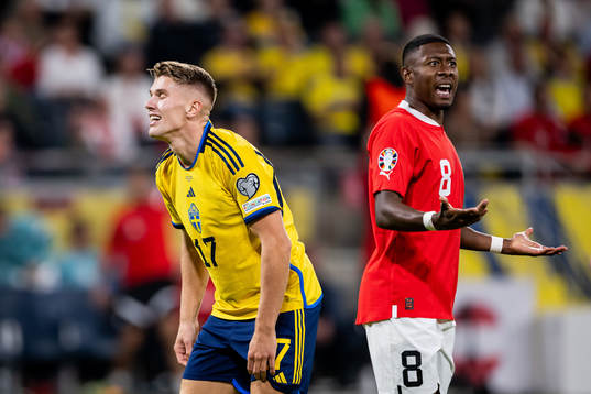 Viktor Gyökeres of Sweden looks dejected next to David