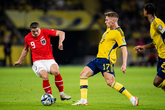 Marcel Sabitzer of Austria and Viktor Gyökeres of Sweden