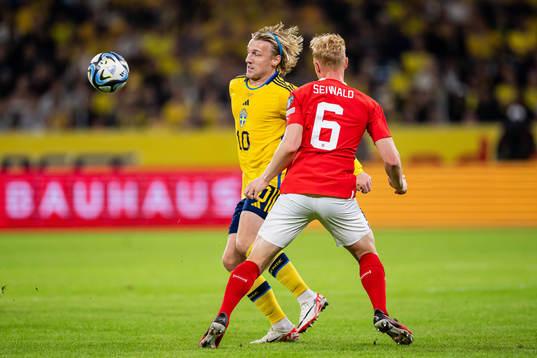 Emil Forsberg of Sweden and Nicolas Seiwald of Austria