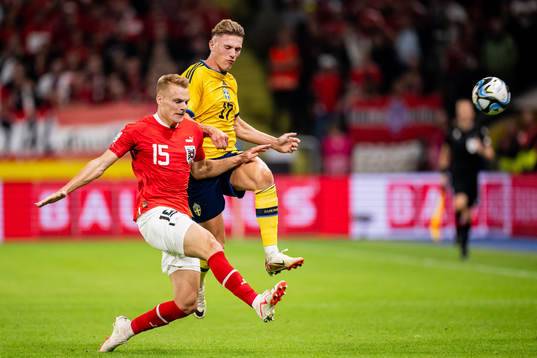 Philipp Lienhart of Austria and Viktor Gyökeres of Sweden