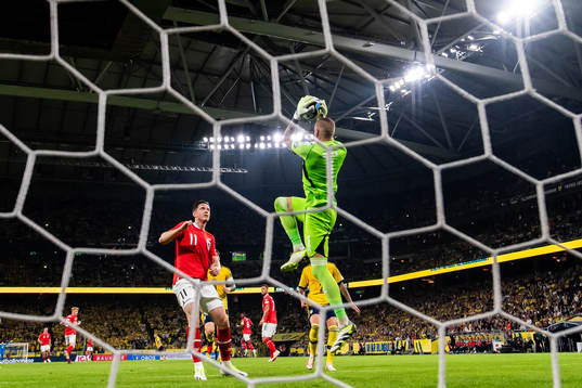 Michael Gregoritsch of Austria and goalkeeper Robin Olsen