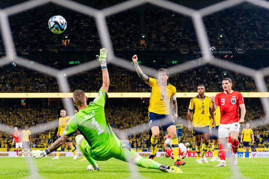 Marcel Sabitzer of Austria scores a goal against goalkeeper