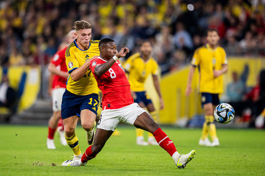 Viktor Gyökeres of Sweden and David Alaba of Austria