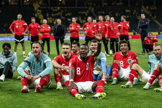 David Alaba of Austria celebrate with teammates