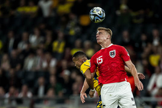 Robin Quaison of Sweden and Philipp Lienhart of Austria