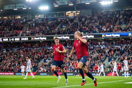 Erling Braut Haaland of Norway celebrates with teammate
