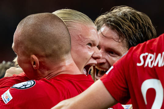 Erling Braut Haaland of Norway celebrates with teammates