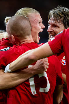 Erling Braut Haaland of Norway celebrates with teammates
