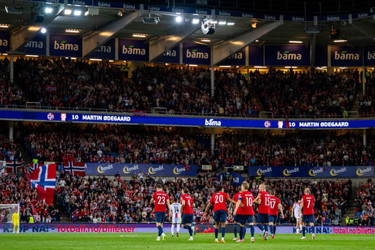 Martin Ødegaard of Norway celebrates with teammates