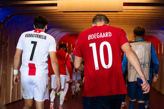 Khvicha Kvaratskhelia of Georgia and Martin Ødegaard of
