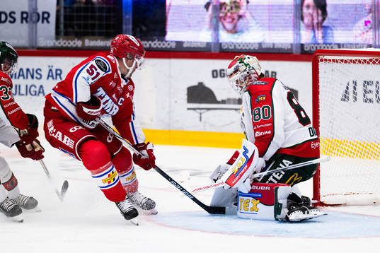 Timrås Anton Lander och Frölundas målvakt Frederik Dichow