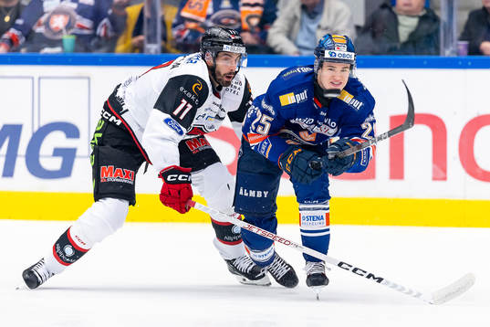Malmö Redhawks Markus Lauridsen och Växjös Filip Eriksson