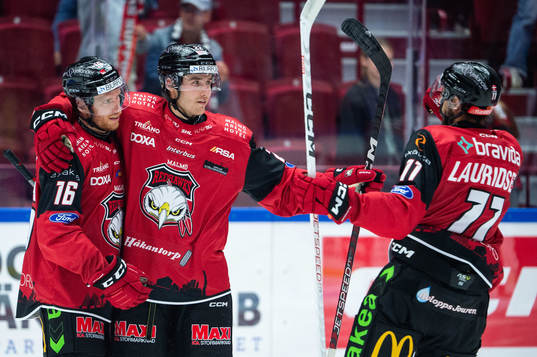 Malmö Redhawks Janne Kuokkanen jublar med Matias Lassen