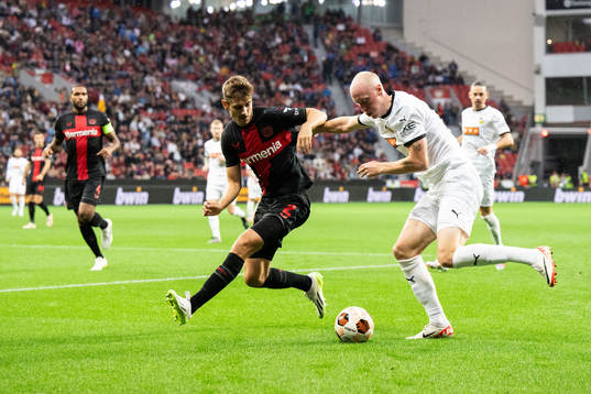 Josip Stanisic of Bayer Leverkusen and Valgeir Lunddal of