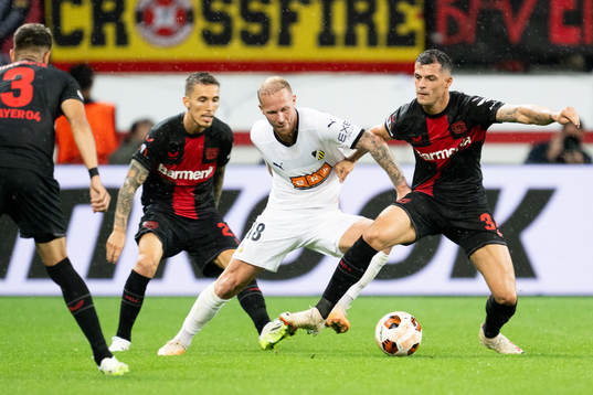 Mikkel Rygaard Jensen of Häcken and Granit Xhaka of Bayer