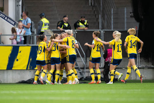 Magdalena Eriksson of Sweden celebrates with team mates