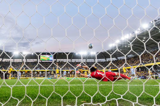 Athenea del Castillo of Spain scores 1-1 behind goalkeeper