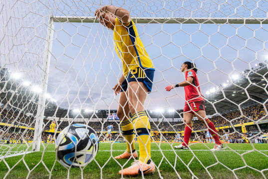 Magdalena Eriksson and goalkeeper Zecira Musovic of Sweden