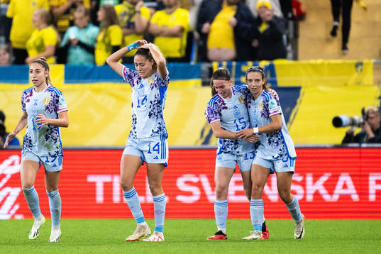 Eva Maria Navarro Garcia of Spain celebrates with team mates