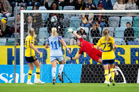 Eva Maria Navarro Garcia of Spain (not pictured) scores 1-2