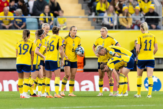 Players of Sweden look dejected