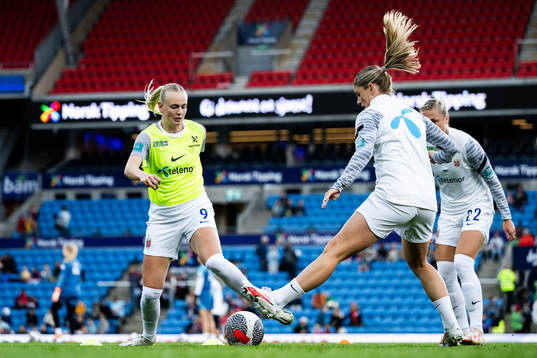 Karina Sævik and Maren Mjelde of Norway warm up