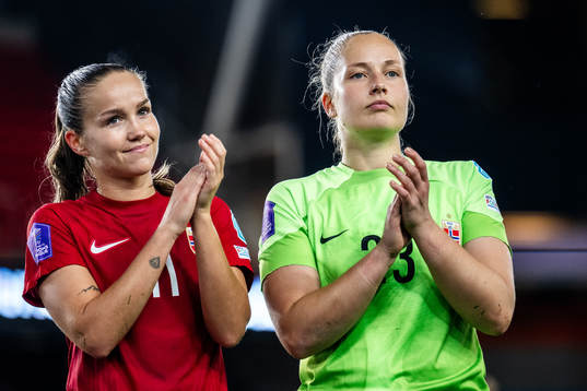 Guro Reiten and goalkeeper Aurora Mikalsen of Norway
