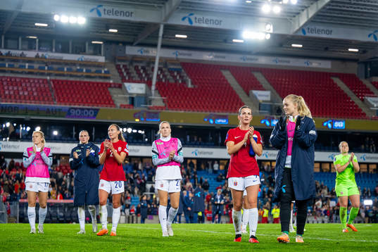 Tuva Hansen and goalkeeper Guro Pettersen of Norway