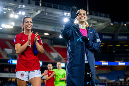 Tuva Hansen and goalkeeper Guro Pettersen of Norway