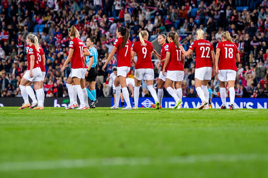 Karina Sævik of Norway celebrates with Marit Bratberg Lund