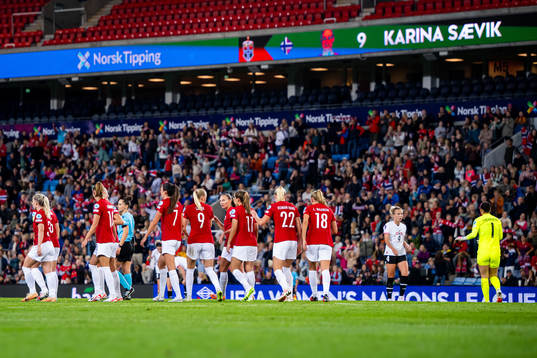 Karina Sævik of Norway celebrates with Marit Bratberg Lund