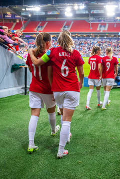 Guro Reiten and Maren Mjelde of Norway at half-time