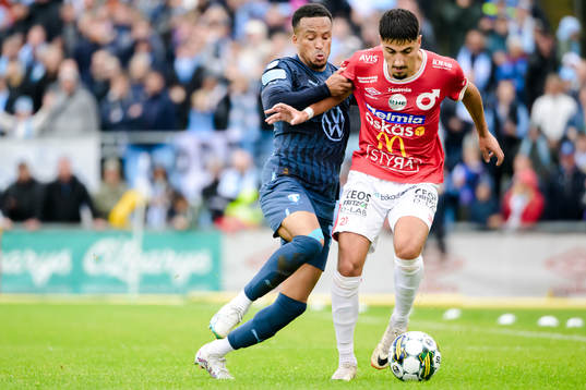 Malmö FFs Martin Olsson och Degerfors Peter Gwargis