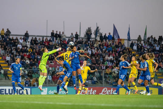 goalkeeper Laura Giuliani and Martina Piemonte of Italy and