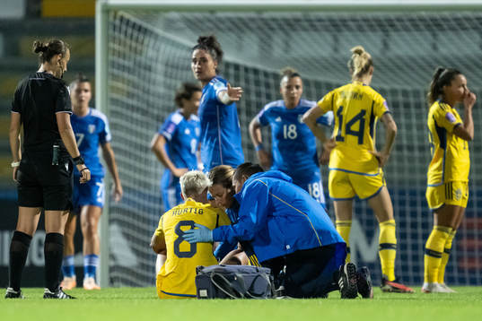 Lina Hurtig of Sweden is being taken care of Physio Jenny