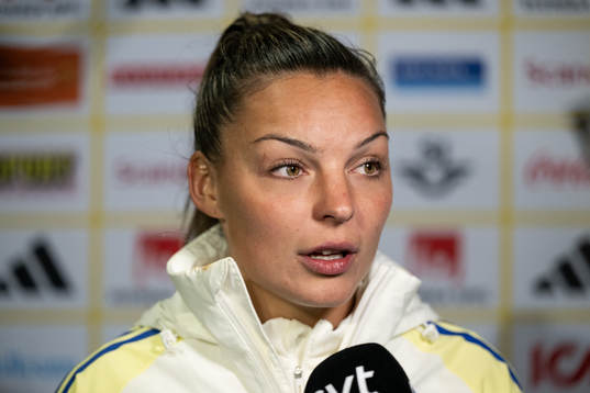 Johanna Rytting Kaneryd of Sweden speaks to media