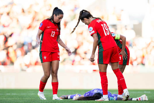 Fatima Pinto and goalkeeper Ines Pereira of Portugal