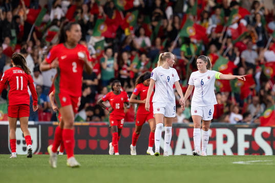 Karina Sævik and Maren Mjelde of Norway look dejected