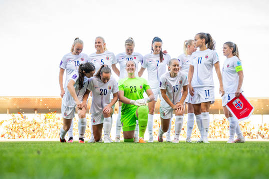Goalkeeper Aurora Mikalsen and players of Norway pose for a