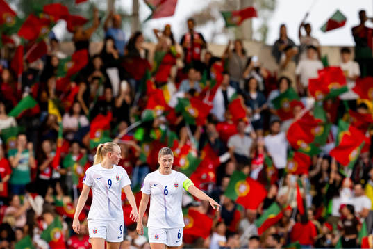 Karina Sævik and Maren Mjelde of Norway look dejected