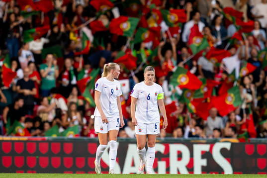 Karina Sævik and Maren Mjelde of Norway look dejected