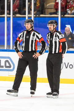Domare Robin Jacobsson och Domare David Laksola