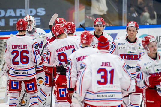 Timrås spelare jublar