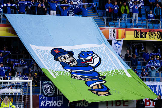 Spectators in the stands and TIFO