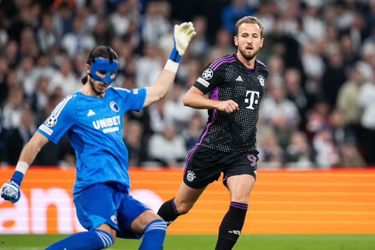 goalkeeper Kamil Grabara of Copenhagen and Harry Kane of